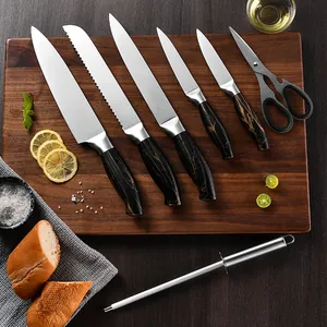 Professional 8-piece kitchen knife set with elegant marble pattern handles on wood
