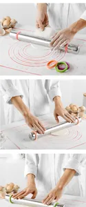 Action shot of an adjustable stainless steel rolling pin being used on a measurement mat