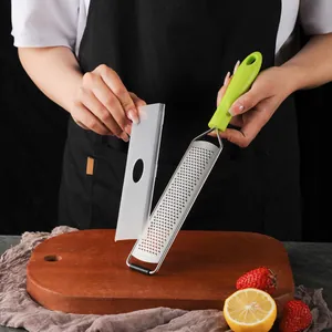 Zesteur de citron et râpe à fromage en acier inoxydable avec poignée ergonomique verte