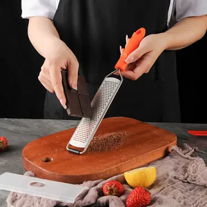 Zesteur de citron et râpe à fromage multifonction en acier inox avec poignée orange