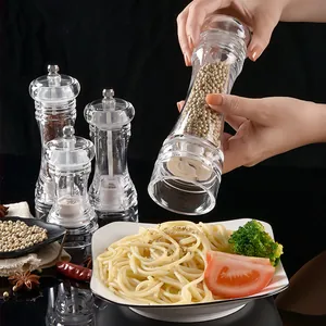 Clear acrylic manual spice grinder set for pepper and sea salt with ceramic core.