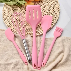 Comprehensive 5-piece pink silicone baking set including whisk, turner, and spatulas