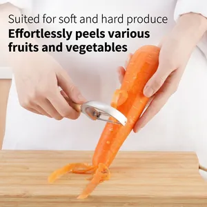 Ergonomic vegetable peeler with solid wood handle peeling a fresh carrot on board