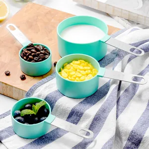 Set of 4 mint green plastic measuring cups with stainless steel handles for kitchen baking