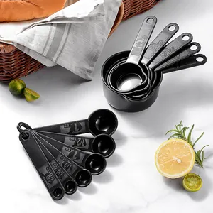 11-piece black plastic measuring cups and spoons set with clear engraved scales
