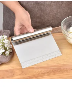 Detailed view of 430 stainless steel dough scraper featuring an etched measuring scale