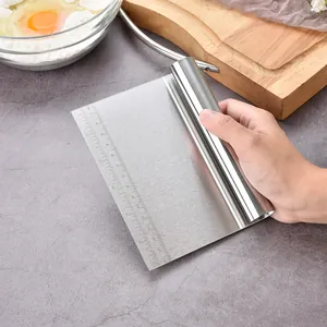 Professional stainless steel dough scraper with precise measurement scales for baking
