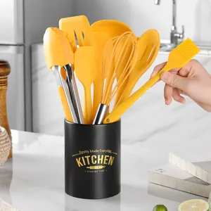 10-piece vibrant yellow silicone kitchenware set with black storage holder