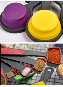 Close-up detail of collapsible silicone measuring cups and spoons with capacity markings