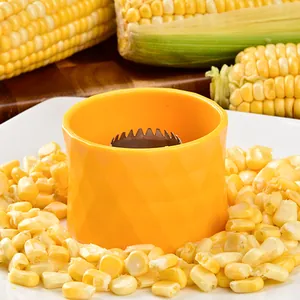 Efficient yellow circular corn stripper with sharp stainless steel blade for kitchen