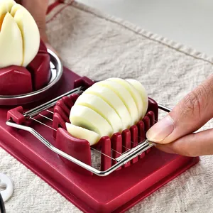 Multifunctional red kitchen egg slicer with stainless steel wires for flower shape slicing
