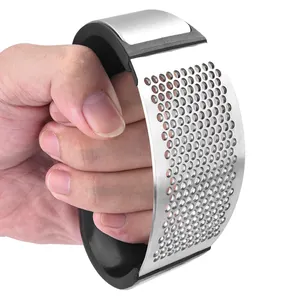 Manual ergonomic stainless steel garlic press rocker tool with comfortable black grip