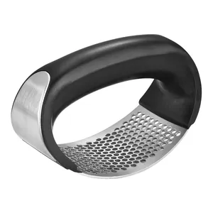 Ergonomic stainless steel manual garlic press with curved black handle for kitchen mincing
