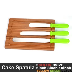 Set of 3 stainless steel icing spatulas in 6, 8, and 10-inch sizes with green handles