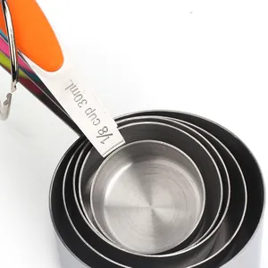 Professional stainless steel measuring cup set with colorful silicone handles for baking