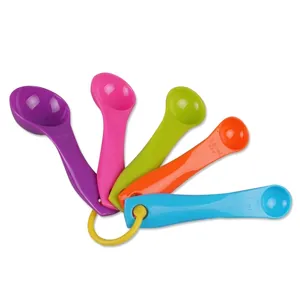 Set of five colorful plastic measuring spoons for baking and cooking measurements
