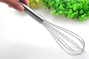 Close-up of durable 10-inch stainless steel manual whisk for professional kitchen baking