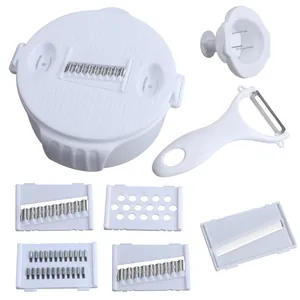 White multifunctional vegetable slicer set with storage container and five blades