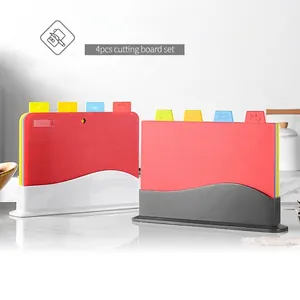 Four-piece color-coded plastic cutting board set with vertical storage stand for kitchen