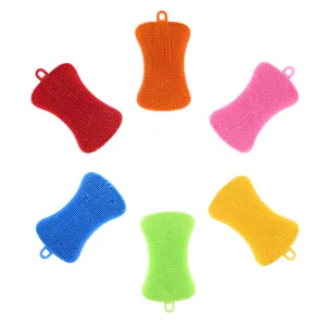 Set of six colorful silicone dish brushes with a soap-shaped design and hanging loops