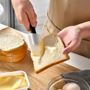 Large silicone spatula with long handle for baking and spreading butter on toast