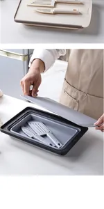 Detailed view of the 2-piece foldable drain basket and cutting board set with utensils