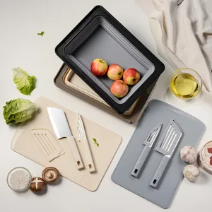 Portable folding colander and cutting board set for kitchen and outdoor camping picnic use.