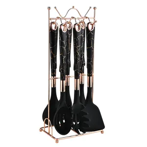 7-piece heat resistant black silicone kitchen utensil set with rose gold storage rack