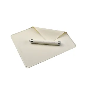Cream food-grade silicone rolling pin and non-stick baking mat set with scale markings