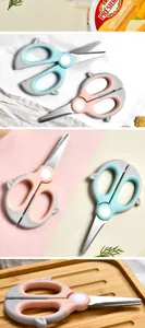 Detailed view of portable stainless steel baby food scissors with cute elephant-shaped handles