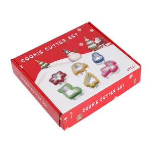 Premium 6-piece Christmas cookie cutter set featuring snowflake and tree shapes in gift box