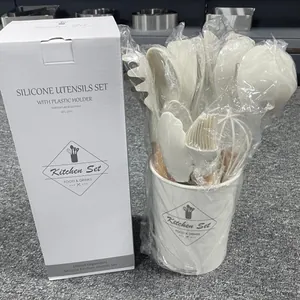 11-piece white silicone kitchen utensil set with wooden handles and plastic holder