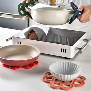 Multi-color heat resistant silicone trivets for pots and pans on kitchen table protection