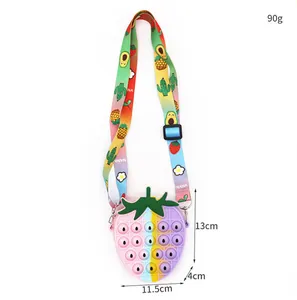 Colorful strawberry silicone pop bubble crossbody bag featuring size and weight details