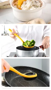 Foto di utensili da cucina in silicone giallo utilizzati per cucinare e pulire in padella