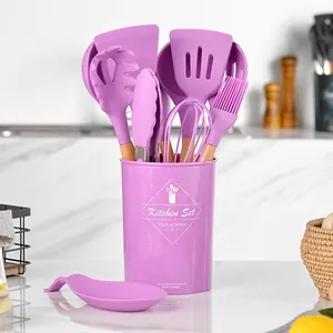12-piece purple silicone kitchen utensil set with natural wooden handles and bucket