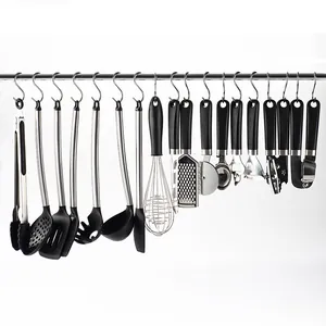 Set of stainless steel S-hooks for kitchen utensil organization hanging on a metal rod
