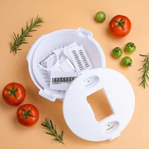 White multifunctional vegetable cutter set with stainless steel blades and colander basket
