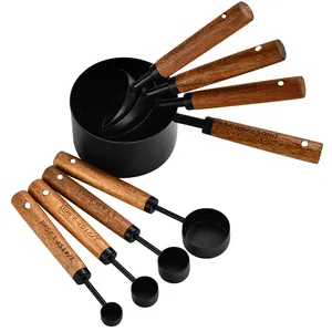8-piece professional black stainless steel measuring cup and spoon set with wooden handles