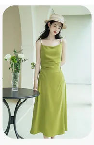 Elegant French style green camisole dress with pleated waist and pearl strap details