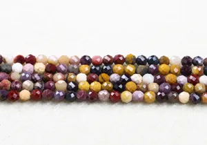 Macro view of faceted natural mookaite jasper round beads for DIY jewelry making