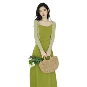Elegant French green camisole dress with knit cardigan set for spring summer 2025