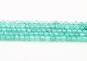 Macro detail of faceted green aventurine round beads for DIY jewelry accessories