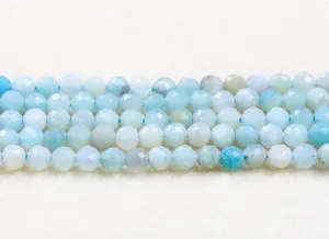 Detailed macro view of faceted natural 5A Amazonite round beads for DIY jewelry making