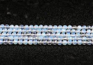 Macro detail view of sparkling faceted synthetic opal round beads for DIY jewelry accessories