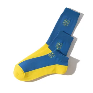 Set of three Ukraine flag themed cotton socks in blue and yellow with trident embroidery