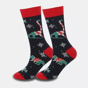 Festliche Dinosaurier- und Schneeflockenmuster auf dunkelblauen mittellangen Socken.