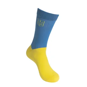 Blue and yellow cotton socks featuring an embroidered Ukrainian trident coat of arms.