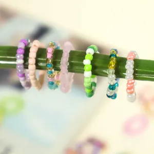 Bohemian colorful seed bead rings set in vibrant dopamine style fashion