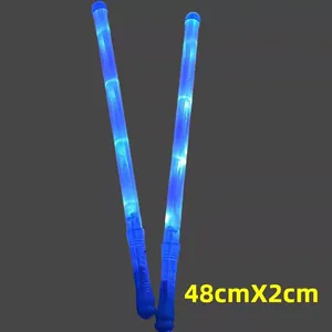 Close-up detail of 48cm long blue LED foam glow sticks for party concert atmosphere